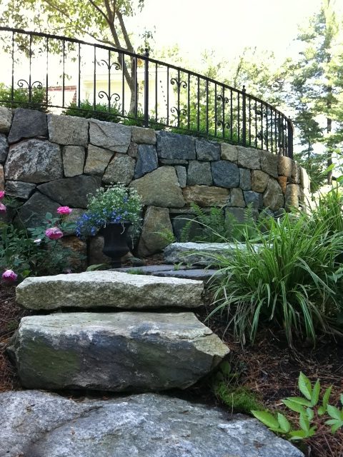 Retaining Wall with Decorative Wrought Iron Railing Top